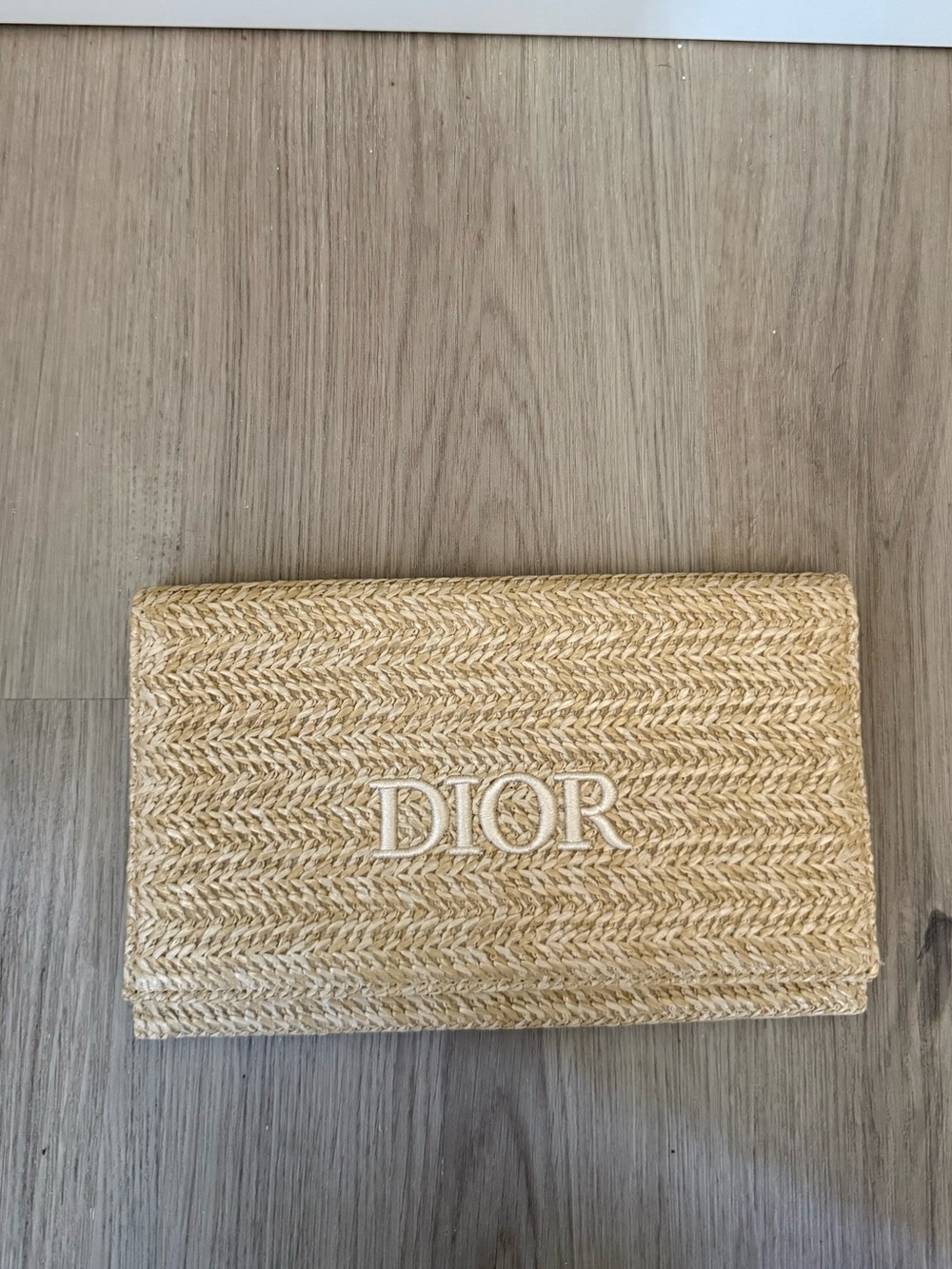 Christian Dior woven/rattan style clutch